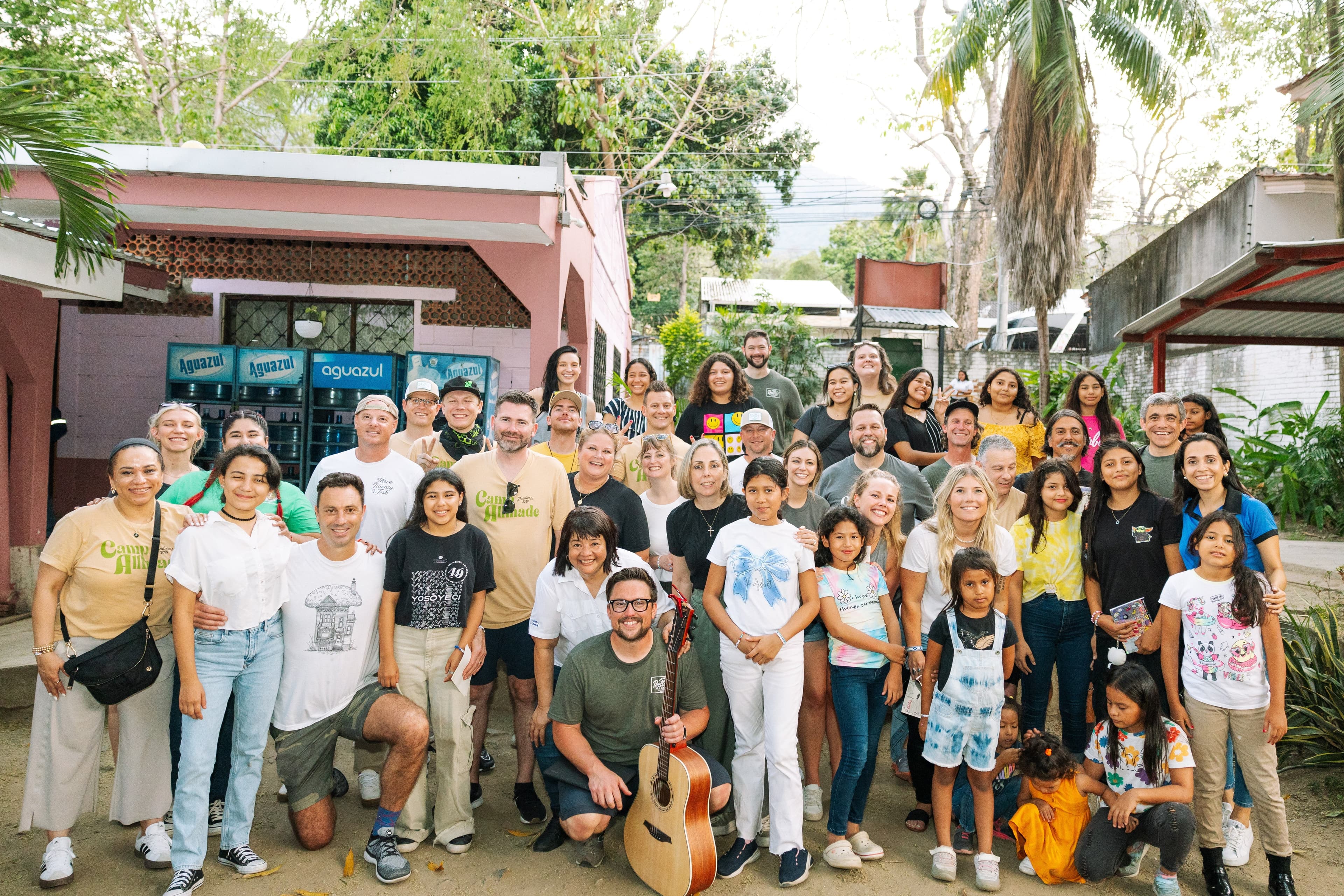 Large group of AllMade partners and volunteers gathered together to support foster kids in Honduras
